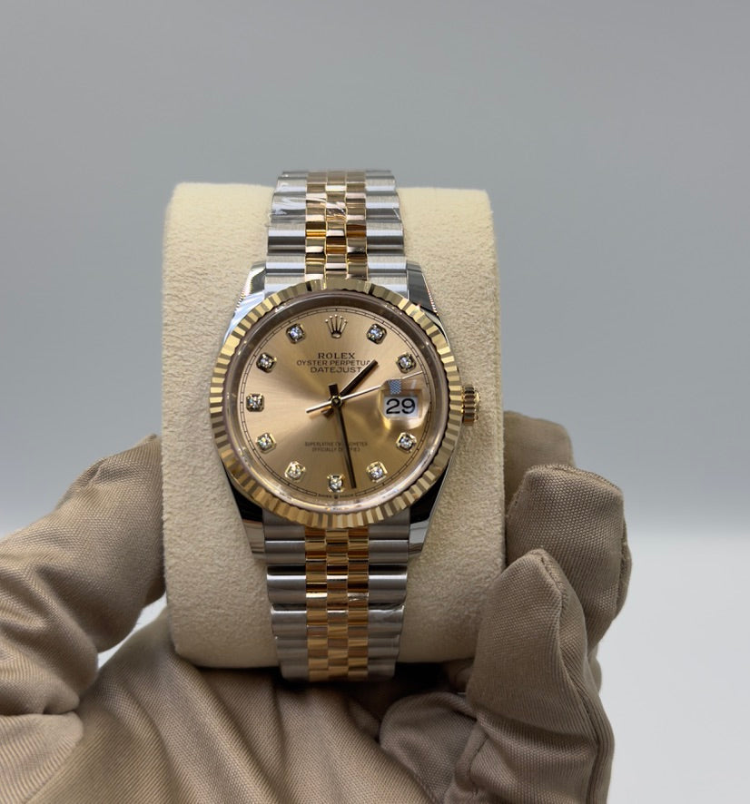 Unworn Rolex Datejust 36mm ref.126233 Champagne Diamond Dial on Jubilee