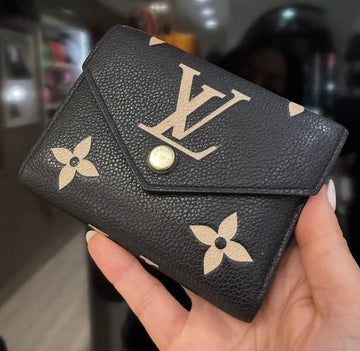 Pre-Owned Louis Vuitton Empreinte Monogram Giant Victorine Wallet – Black & Beige
