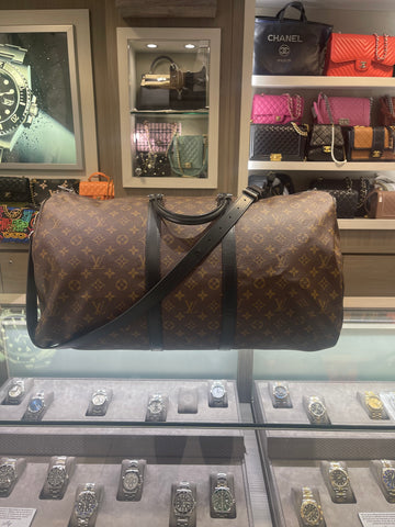 Pre-owned Louis Vuitton Keepall 55 Bandoliere Monogram macassar with strap