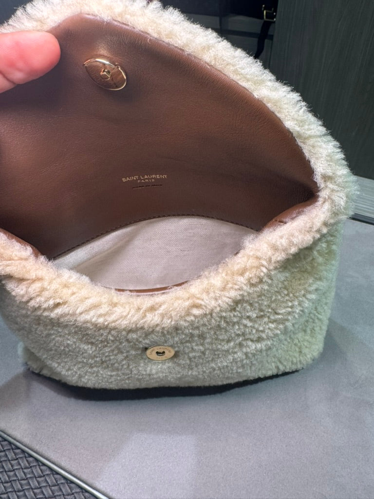 Unworn YSL Saint Laurent shearling pouch with wallet