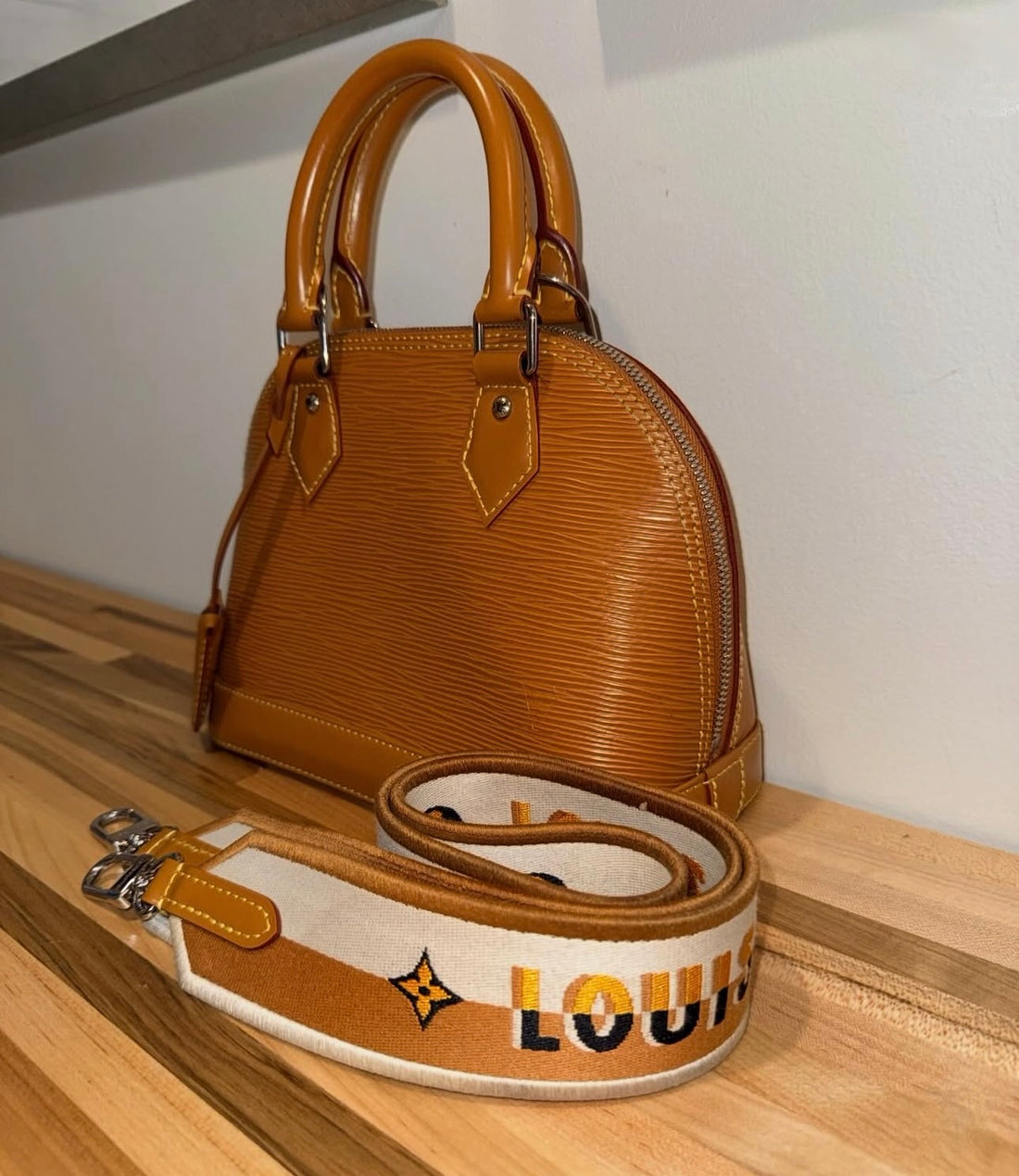Pre-owned Louis Vuitton Alma BB in Gold Miel Epi Leather with Jacquard Canvas Strap