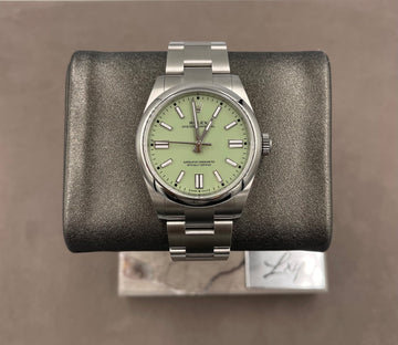 Unworn Rolex Men's Oyster Perpetual 41mm ref.134300 Pistachio Index Dial Smooth Bezel on Oyster w/Box & Card
