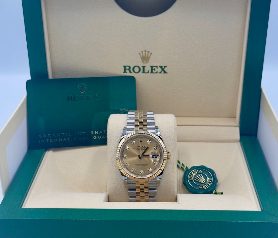 Unworn Rolex Datejust 36mm ref.126233 Champagne Diamond Dial on Jubilee