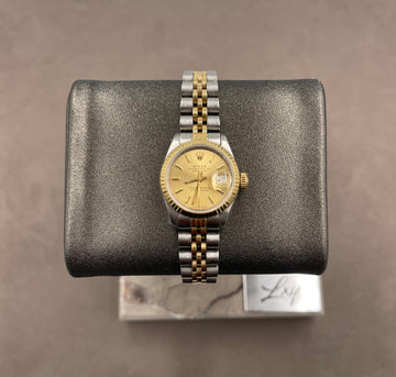 Pre-owned Rolex Ladies-Datejust 26mm ref.69173 Champagne Index Dial Fluted Bezel on Jubilee w/Box & Papers, R SERIAL 1988