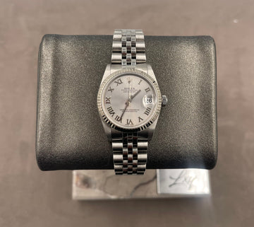Pre-owned Rolex Ladies-Datejust 31mm ref.78274 Silver Roman Dial Fluted Bezel on Jubilee, w/Box