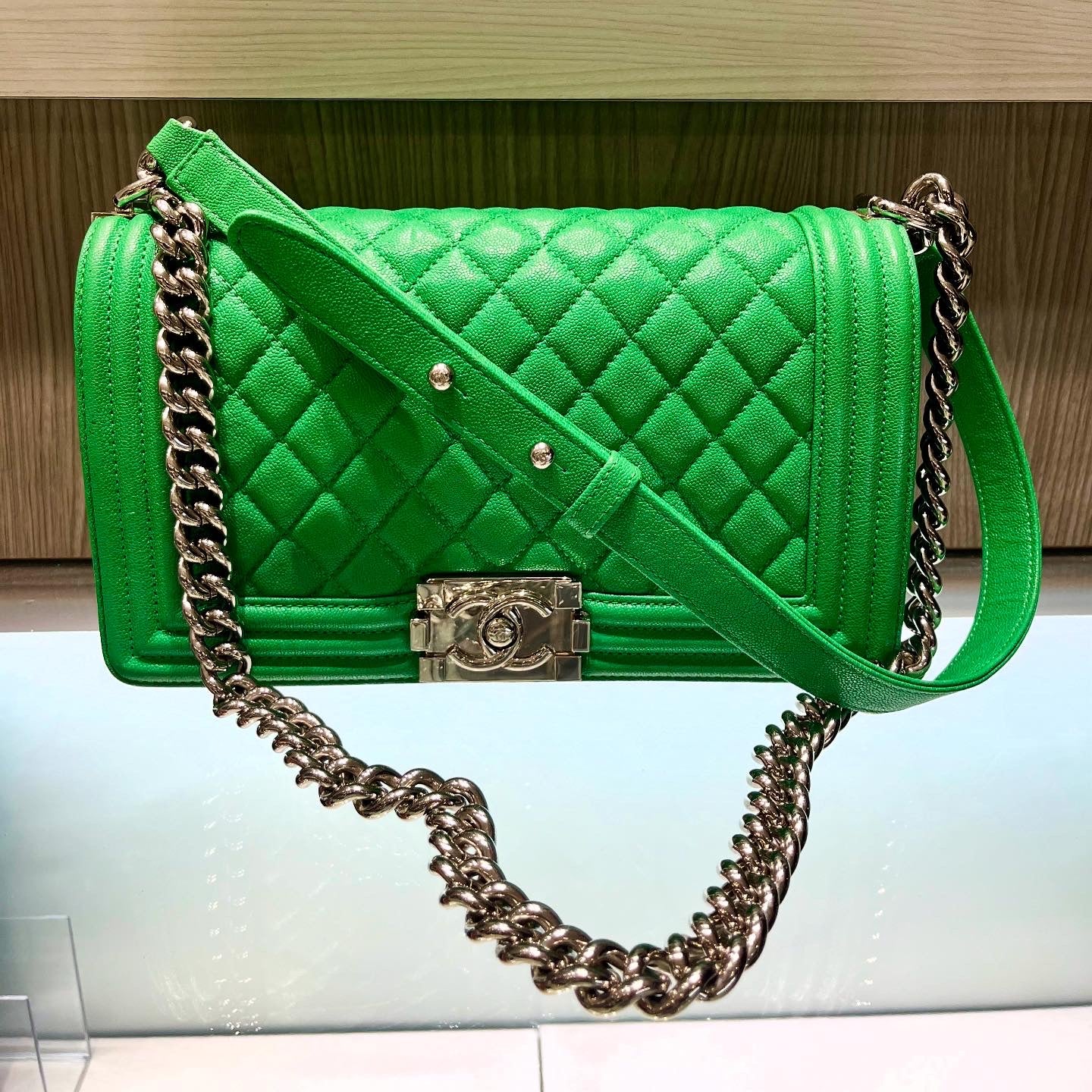 Pre-Owned Chanel Old Medium Boy Bag in Metallic Green Caviar with Silver Hardware