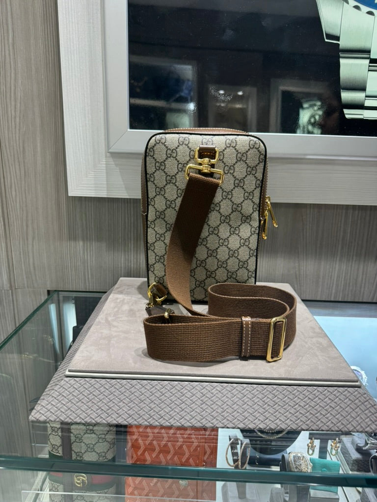 Unworn Gucci SLING BACKPACK WITH INTERLOCKING G Style: 696016