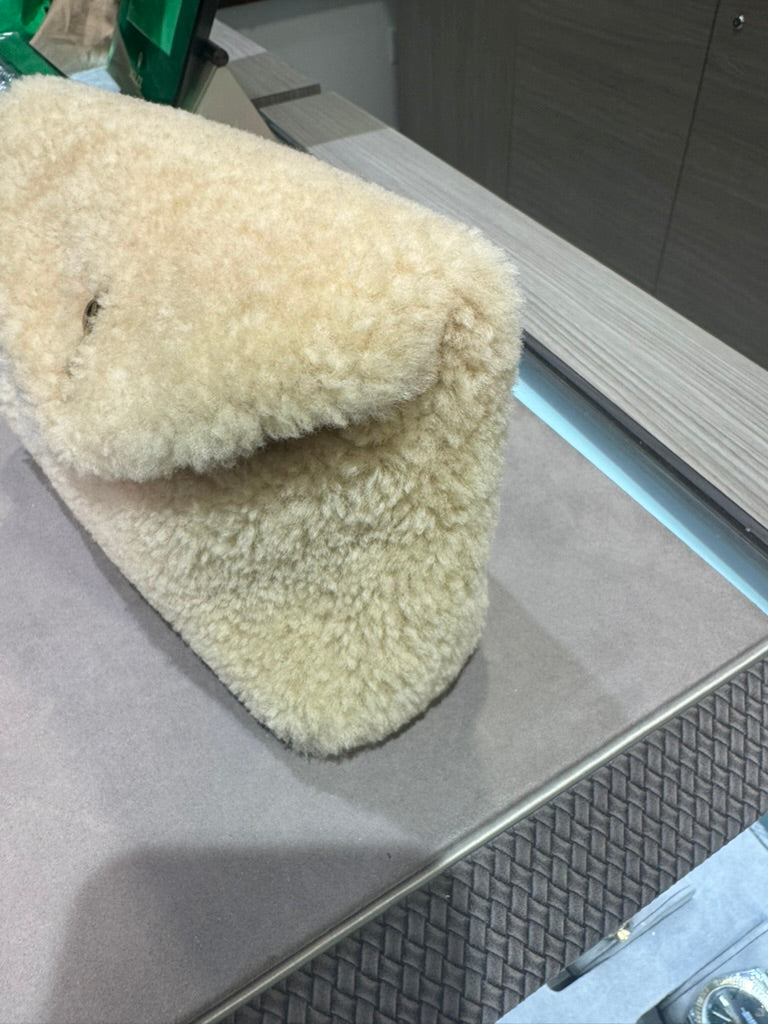 Unworn YSL Saint Laurent shearling pouch with wallet