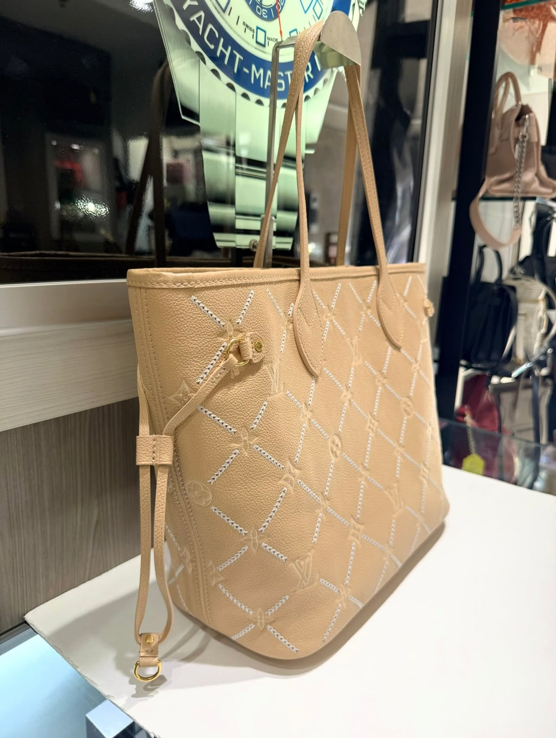 Pre-Owned Louis Vuitton Neverfull MM Monogram Empreinte Couture in Hazelnut