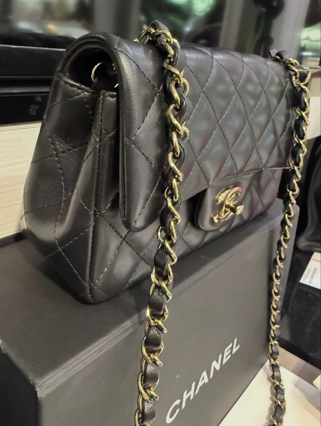 Pre-Owned Chanel Lambskin Quilted Mini Rectangular Flap Bag in Black with Gold Hardware (2022)