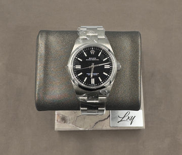 Pre-owned Rolex Men's Oyster Perpetual 41mm ref.134300 Black Dial Smooth Bezel on Oyster w/Box & Card (2025)