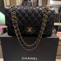 Pre-owned Chanel Black Medium Classic Double Flap Bag w/ GHW