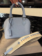 Pre-Owned Louis Vuitton Alma BB Bleu Nuage Epi Leather with Canvas Strap