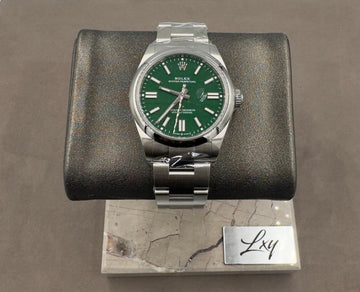 Unworn Rolex Men's Oyster Perpetual 41mm ref.134300 Green Dial Smooth Bezel on Oyster w/Box & Card