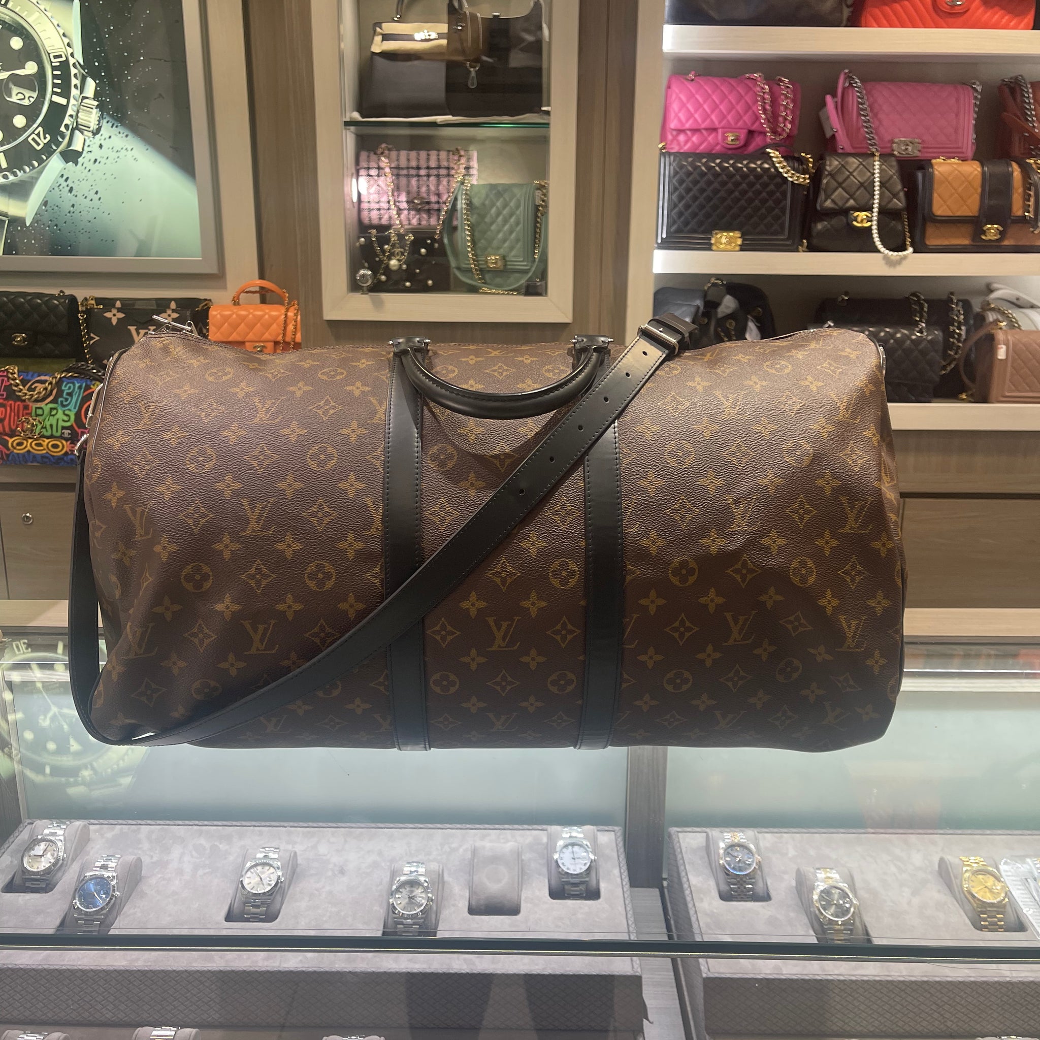 Pre-owned Louis Vuitton Keepall 55 Bandoliere Monogram macassar with strap