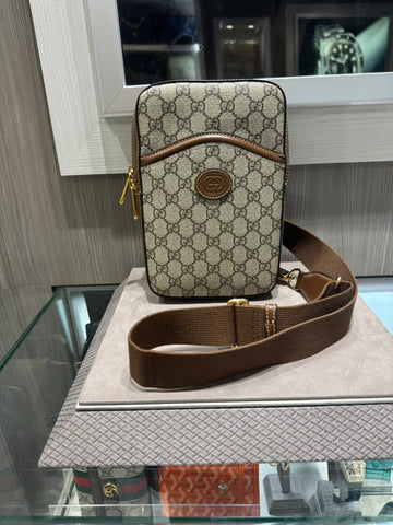 Unworn Gucci SLING BACKPACK WITH INTERLOCKING G Style: 696016