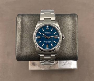 Unworn Rolex Men's Oyster Perpetual 41mm ref.134300 Med Blue Index Dial Smooth Bezel on Oyster w/Box & Card