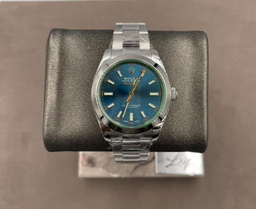 Pre-owned Rolex Men's Milgauss 40mm ref.116400GV Blue Dial Green Glass Smooth Bezel on Oyster w/Box & Card
