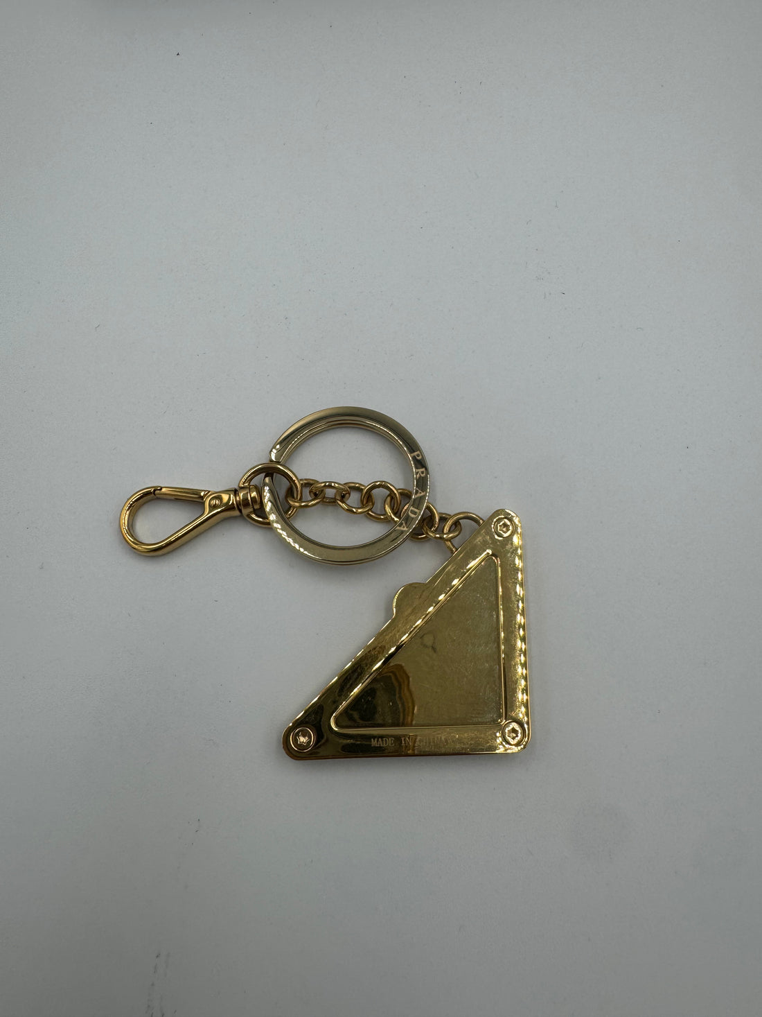 Pre-owned Prada Keychain White and Gold with box and tags