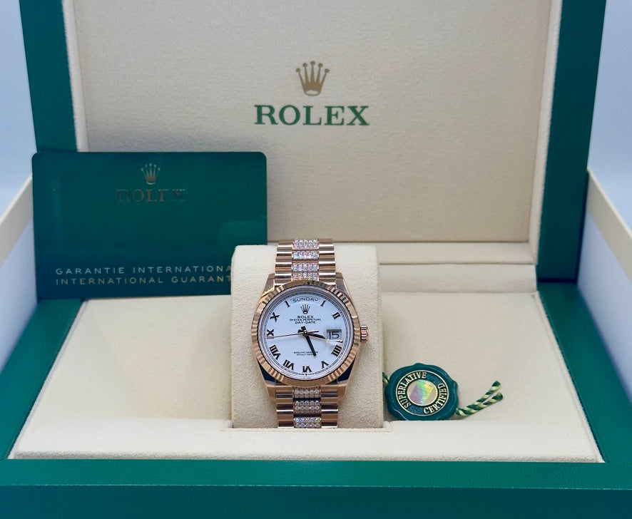 Unworn Rolex Oyster Perpetual Day-Date 36mm ref.128235 White Roman Dial on Diamond set President bracelet