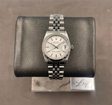 Pre-owned Rolex Ladies-Datejust 31mm ref. 78274 Factory Silver Index Dial Fluted Bezel on Jubilee, A serial (1999), w/Box