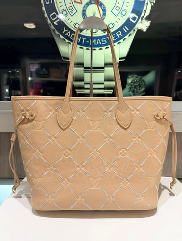 Pre-Owned Louis Vuitton Neverfull MM Monogram Empreinte Couture in Hazelnut