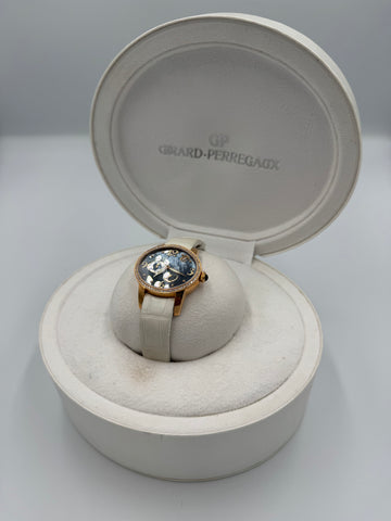 Pre-owned GIRARD PERREGAUX CAT'S EYE MOTHER OF PEARL BLUE DIAMOND DIAL AND DIAMOND BEZEL ref #80481