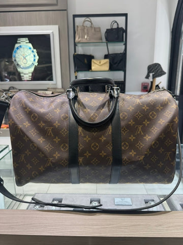 Pre-owned Louis Vuitton Keepall 45 Bandoliere Monogram macassar with strap